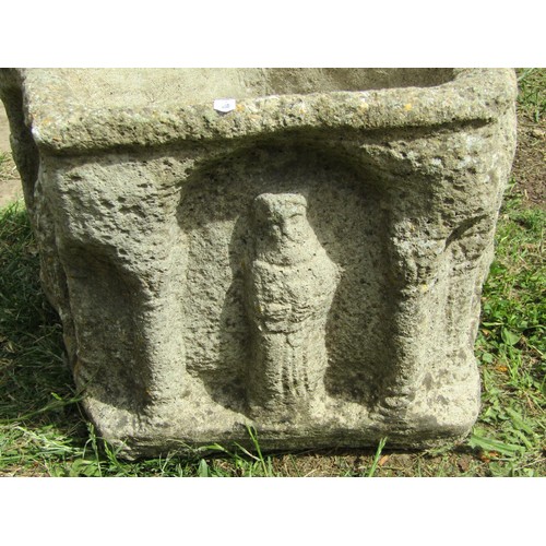 1252 - A pair of weathered mediaeval style planters of pentagonal form with repeating arcaded and figural d... 