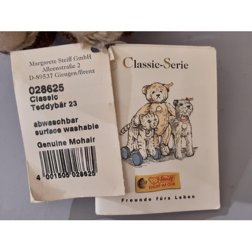 905 - 5 Teddy bears comprising a Steiff Classic Bear 028625 height 23cm, a Dean's Rag Book Charity Bear 20... 