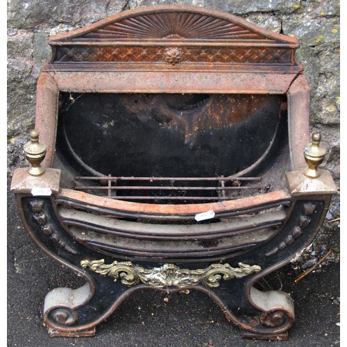 1276 - A small Georgian style mixed metal bow fronted fire basket of classical design raised on scroll supp... 