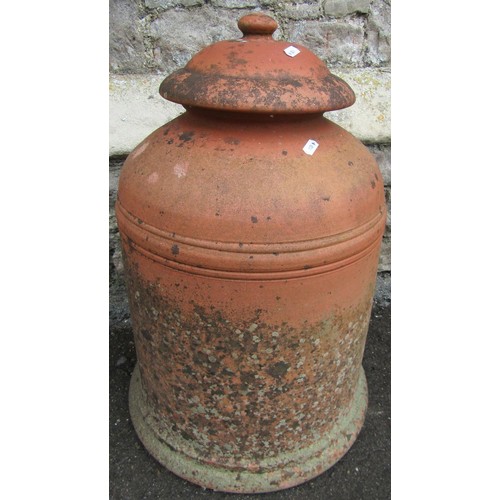 1289 - A weathered terracotta bell shaped rhubarb forcer complete with cap, 60 cm high approximately