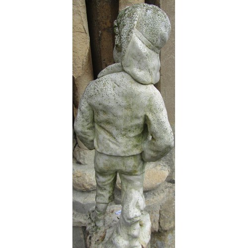 1271 - A cast composition stone garden ornament in the form of a country boy in standing pose raised on a l... 