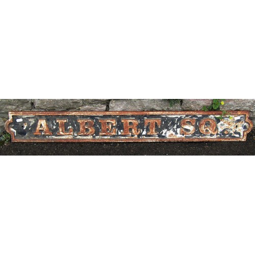 1284 - A weathered cast iron sign with raised lettering 'Albert Square' 14 cm x 109 cm