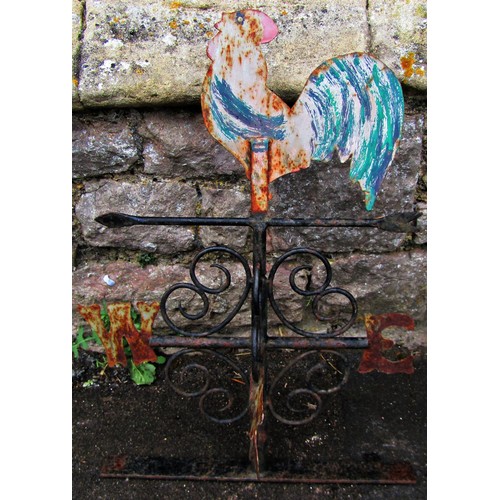 1281 - A small iron work weather vane with open scroll detail and cockerel finial 65 cm high