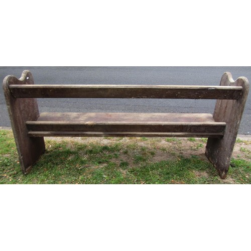 1269 - A stained pine church pew with plank seat, shaped ends and through jointed back rail (af) barn fresh... 