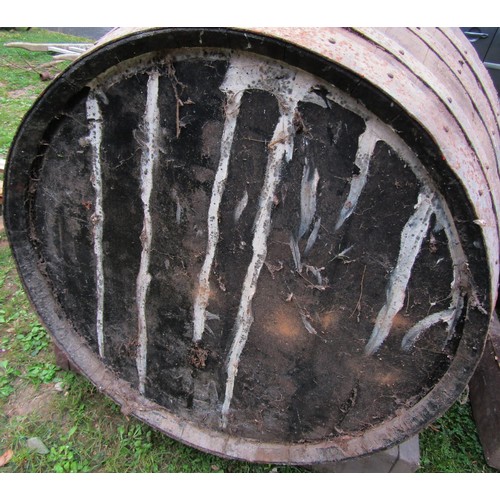 1262 - A large coopered oak and steel banded barrel adapted as a dog kennel, the barrel dimensions 123 cm (... 