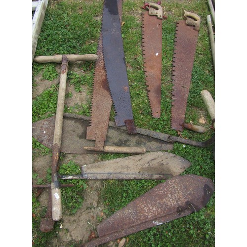 1242 - One lot of vintage tools to include two man saws,  hay knives, unusual wide five pronged fork, etc a... 