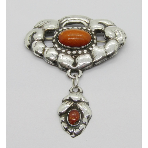 325 - Stylised silver amber brooch, stamped 'M.A. 830S' to reverse, 7.5 x 5.6cm approx (drop amber af)