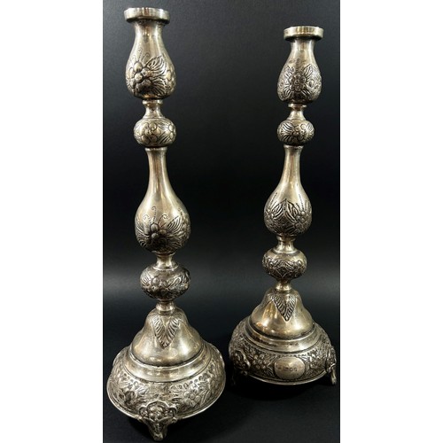 192 - A pair of silver Judaic candlesticks with floral etched design, London, 1919, makers mark J. Zeving,... 