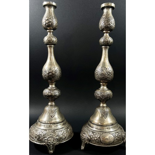 192 - A pair of silver Judaic candlesticks with floral etched design, London, 1919, makers mark J. Zeving,... 