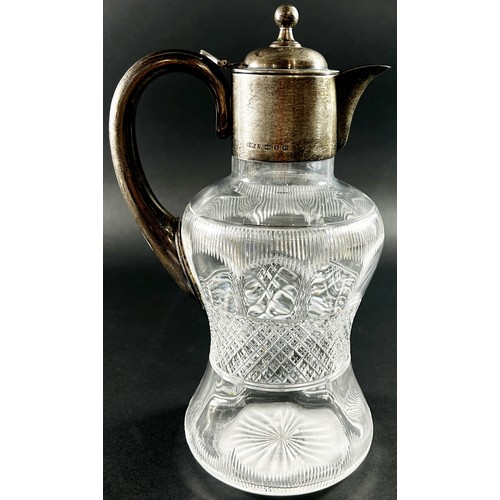 197 - An antique silver mounted glass claret jug, Birmingham, 1899, makers mark Henry Williamson Ltd, 24cm... 