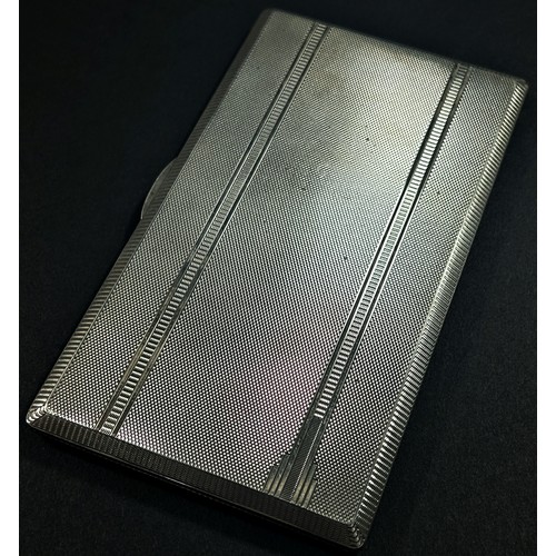 201 - A silver engine turned cigarette case with gilded interior, Birmingham, 1946, makers mark William Su... 