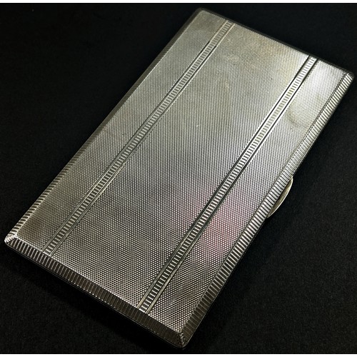 201 - A silver engine turned cigarette case with gilded interior, Birmingham, 1946, makers mark William Su... 