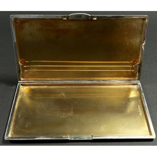 201 - A silver engine turned cigarette case with gilded interior, Birmingham, 1946, makers mark William Su... 