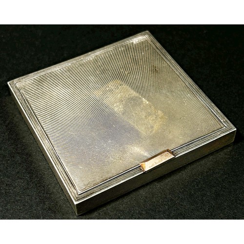 205 - A silver compact stamped with 14k and sterling, London, 1948, makers mark David Sutton and sons, 6.5... 