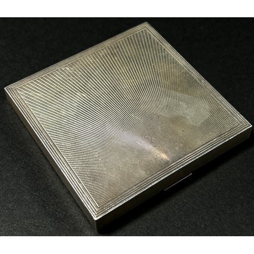 205 - A silver compact stamped with 14k and sterling, London, 1948, makers mark David Sutton and sons, 6.5... 