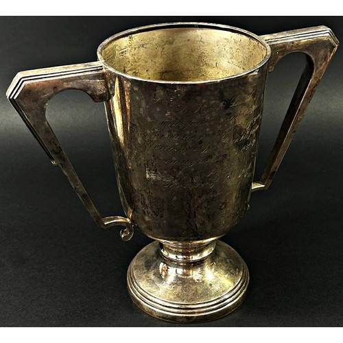 208 - A solid silver hunting trophy,  with a dedication to Harold Smith, a gift from a grateful Duke of Be... 