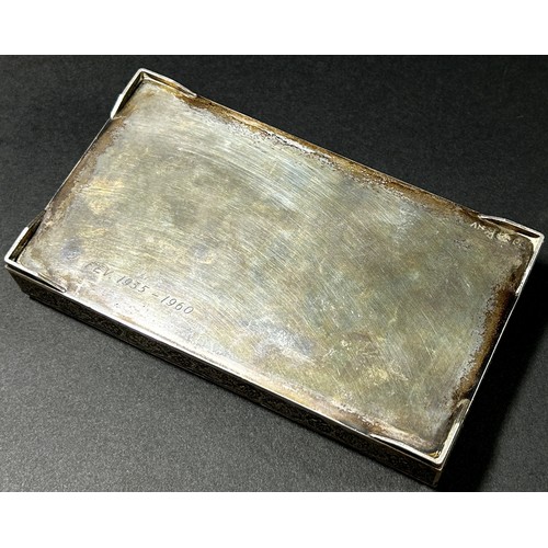 209 - A silver Persian cigarette case with birds and Arabesque design, indistinct hallmarks, 14x8cm, 9oz