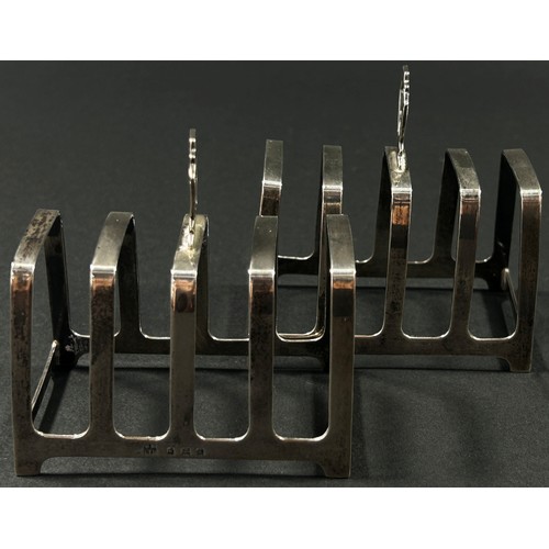 211 - A pair of silver Art Deco toast racks, Birmingham, 1934, makers mark William Neale & Son Ltd, 3.1oz