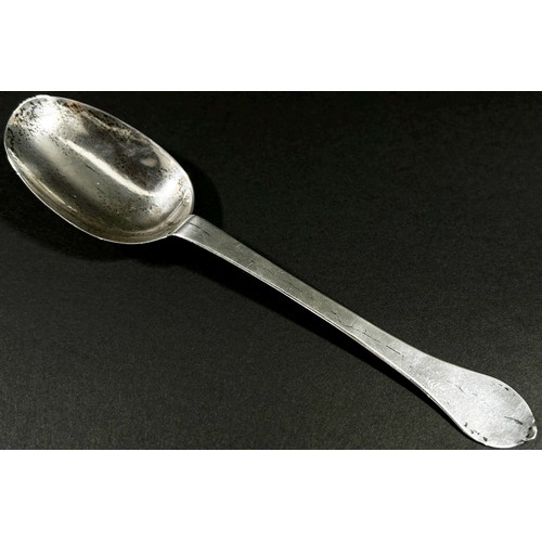 213 - An early 18th Century silver dog nose designed table spoon, etched with the initials 'W.H.S' to the ... 