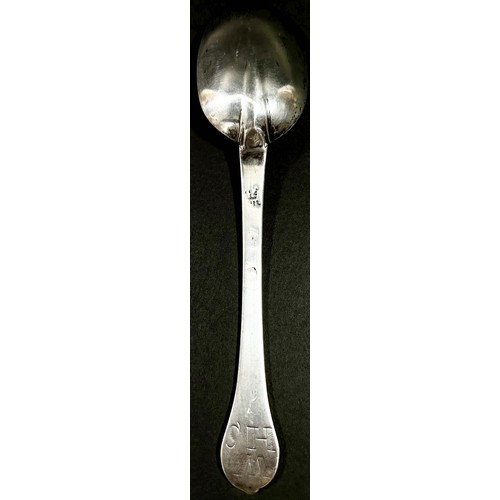 213 - An early 18th Century silver dog nose designed table spoon, etched with the initials 'W.H.S' to the ... 