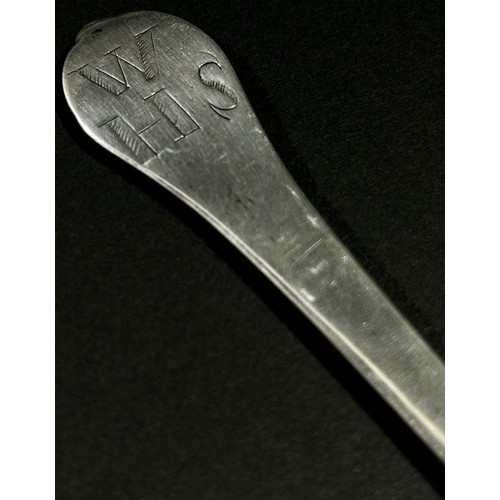 213 - An early 18th Century silver dog nose designed table spoon, etched with the initials 'W.H.S' to the ... 