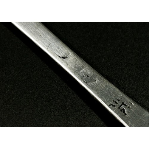 213 - An early 18th Century silver dog nose designed table spoon, etched with the initials 'W.H.S' to the ... 