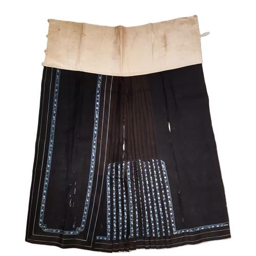 922 - Chinese pleated skirt panel in black silk with embroidered floral bands to front section and edging ... 