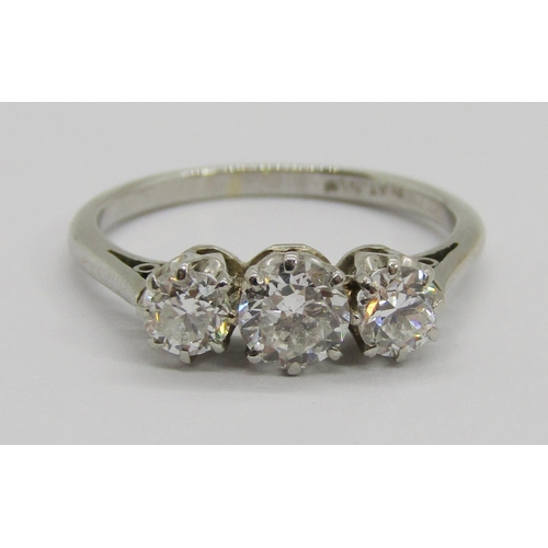 253 - Good quality platinum three stone diamond ring, centre stone 0.25ct approx, each outer stone 0.15ct ... 