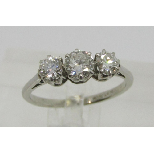 253 - Good quality platinum three stone diamond ring, centre stone 0.25ct approx, each outer stone 0.15ct ... 