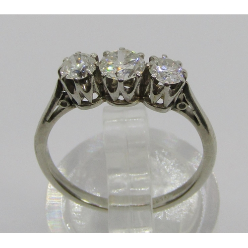 253 - Good quality platinum three stone diamond ring, centre stone 0.25ct approx, each outer stone 0.15ct ... 