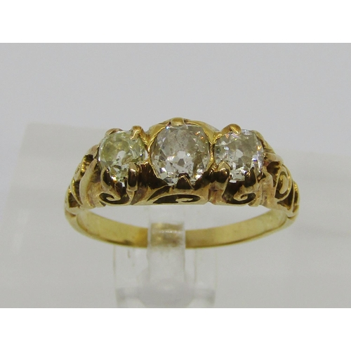 257 - Victorian yellow metal three stone old-cut diamond ring, centre stone 0.45ct approx, outer stones ea... 