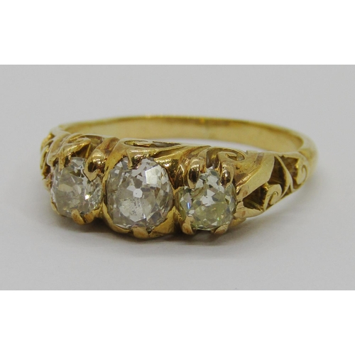 257 - Victorian yellow metal three stone old-cut diamond ring, centre stone 0.45ct approx, outer stones ea... 