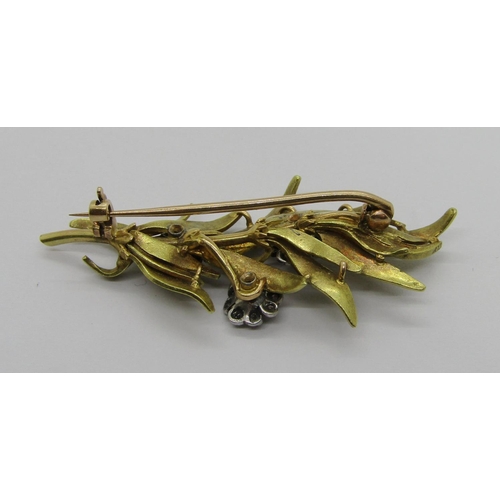 262 - Mid 20th century floral spray brooch set with diamonds in bi-colour metal, 4.9cm approx, 8.7g