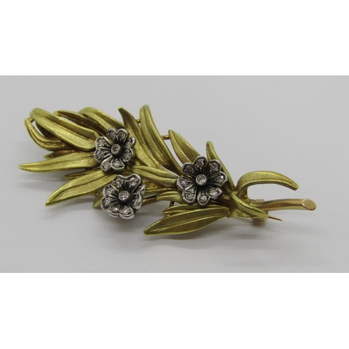 262 - Mid 20th century floral spray brooch set with diamonds in bi-colour metal, 4.9cm approx, 8.7g