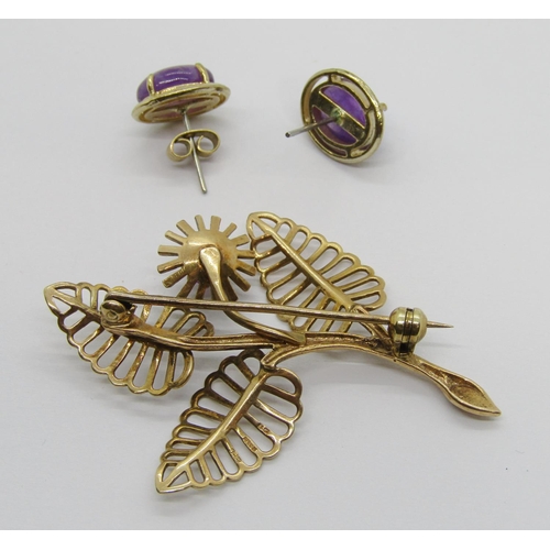 273 - Stylised 9ct spray brooch set with an amethyst, maker 'EFC', Birmingham 1967, 5.2g, together with a ... 