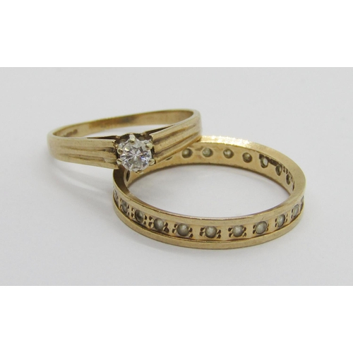 281 - 9ct melee diamond solitaire ring, size L and a further 9ct white stone eternity ring, size P, 3.3g t... 