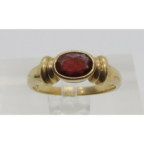 282 - Byzantine style 9ct oval garnet dress ring, size N and a 9ct diamond set signet ring (cut), 8.4g tot... 