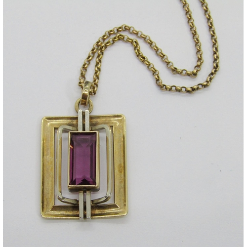 284 - Modernist yellow metal pendant necklace of rectangular form set with amethyst coloured paste, maker ... 