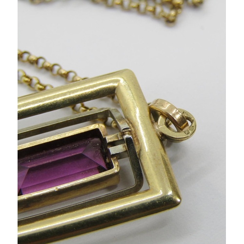 284 - Modernist yellow metal pendant necklace of rectangular form set with amethyst coloured paste, maker ... 