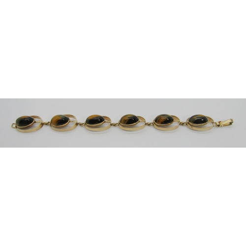 285 - Stylised vintage 9ct cabochon tigers eye bracelet with six oval links, possibly Scandinavian, stampe... 