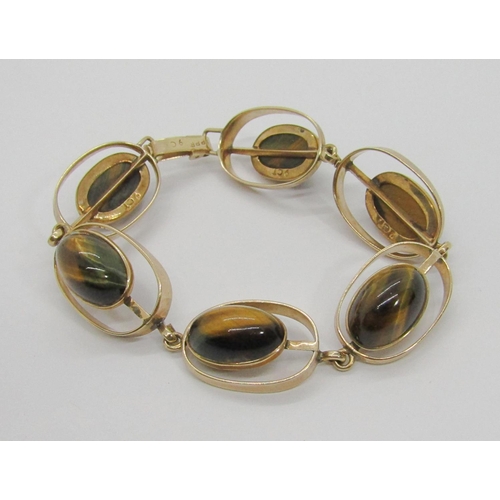 285 - Stylised vintage 9ct cabochon tigers eye bracelet with six oval links, possibly Scandinavian, stampe... 