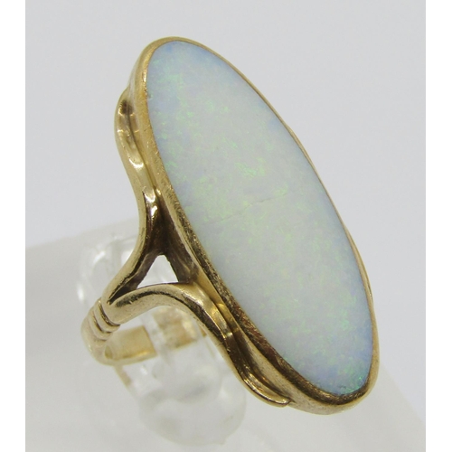 307 - Arts & Crafts style 9ct oval cabochon opal dress ring, maker 'OL', Sheffield 1993, size Q, 8.4g (wor... 