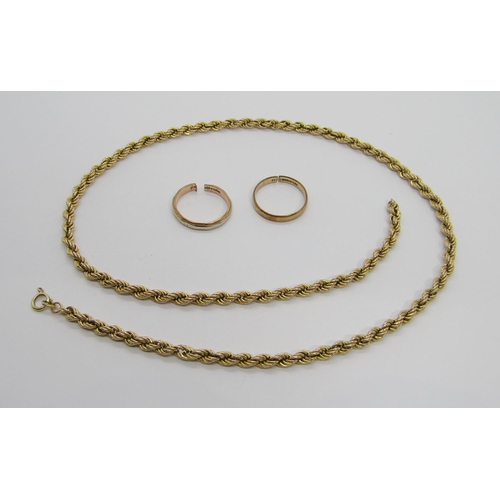 308 - Group of 9ct jewellery comprising a rope twist chain necklace, 51cm L approx and two wedding rings, ... 