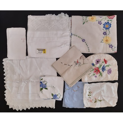 926 - Collection of vintage table linen including colourful hand embroidered cloths, others with wide croc... 