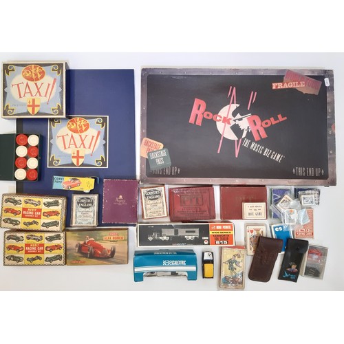 866 - A collection of vintage games and models including Rock N Roll The Music Biz Game by Symmetry, Taxi,... 