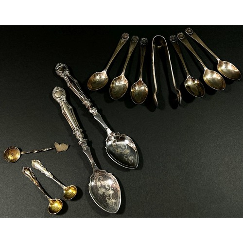 230 - A cased set of six silver teaspoons, a sugar tong and a selection of loose silver and silver plated ... 