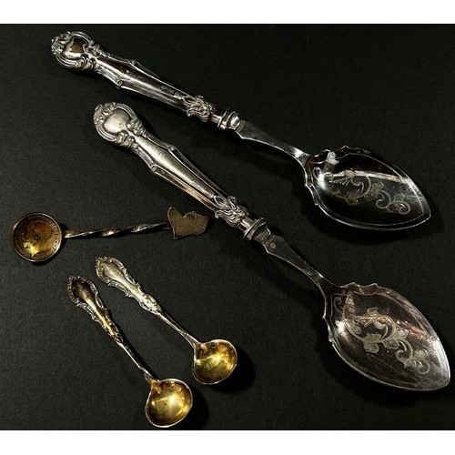 230 - A cased set of six silver teaspoons, a sugar tong and a selection of loose silver and silver plated ... 