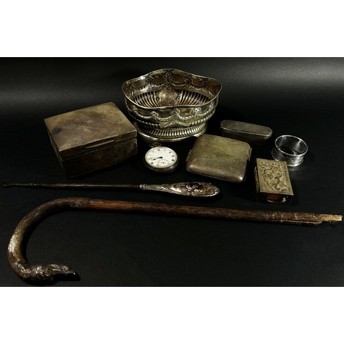 220 - A mixed selection of silver ware including a cigarette box a cigarette case, a napkin ring, a matchb... 