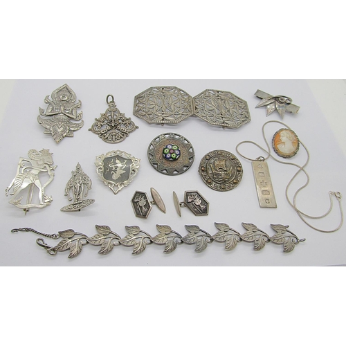 337 - Interesting collection of silver and white metal jewellery to include an Eastern nurses buckle of pi... 