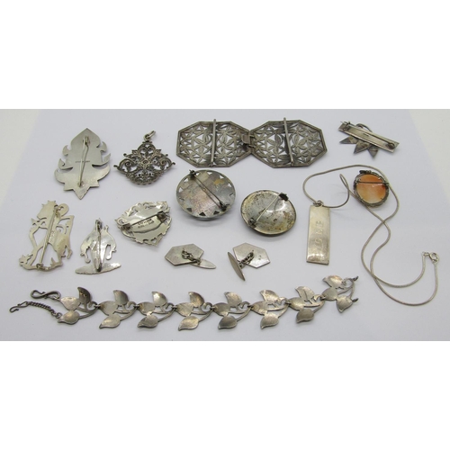 337 - Interesting collection of silver and white metal jewellery to include an Eastern nurses buckle of pi... 